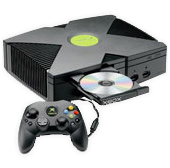Original xbox console with a game disc partially inserted and a controller connected.