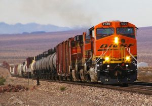BNSF Emulator freight train traversing a desert landscape.